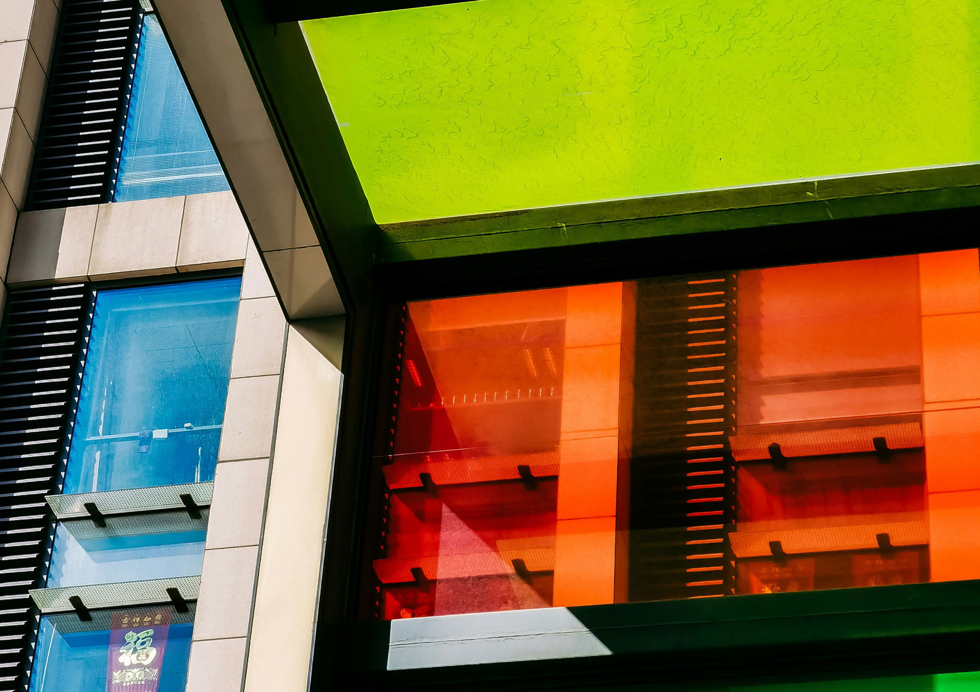 Green and orange concrete building