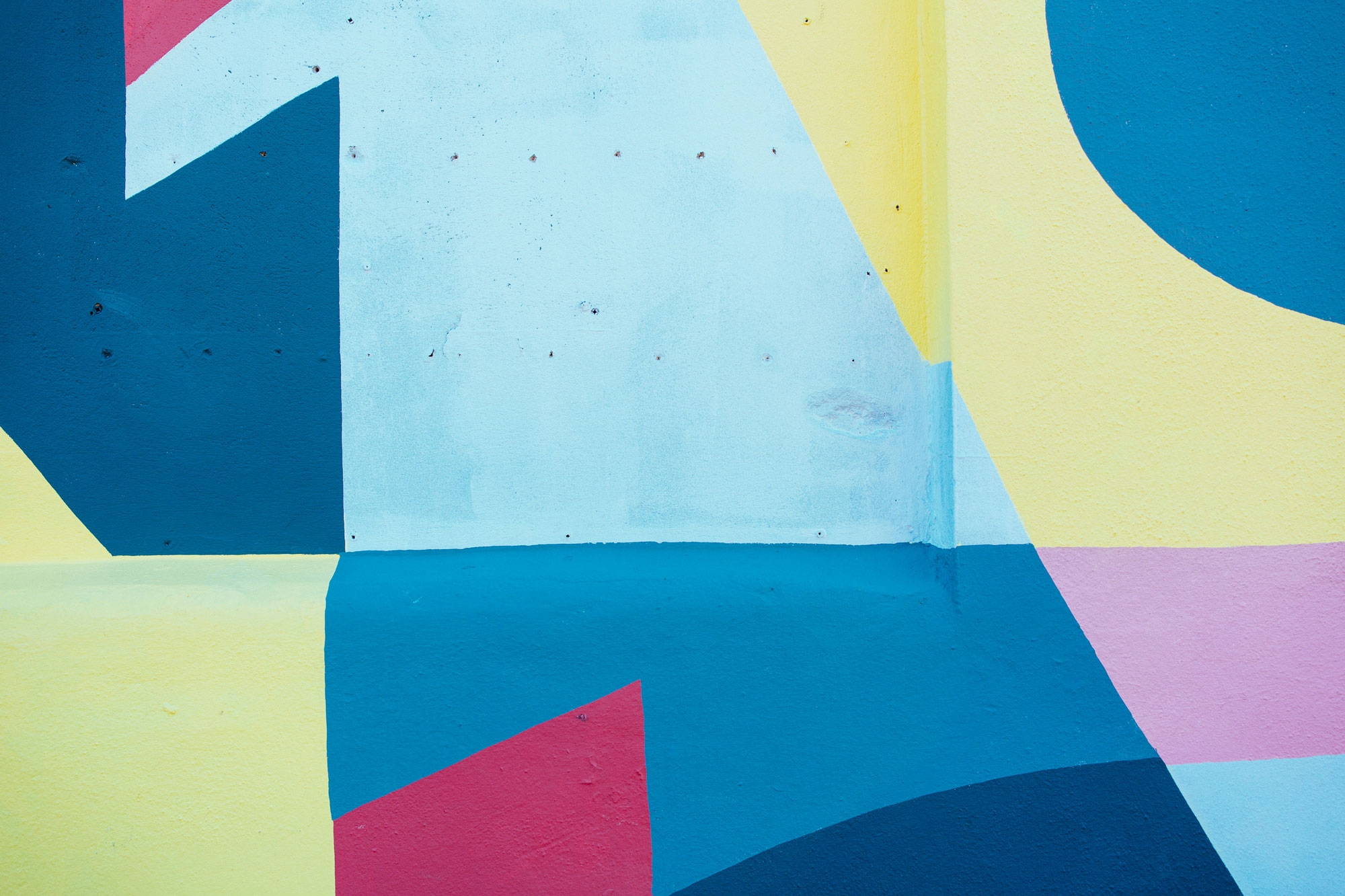 Blue, pink, yellow wall mural