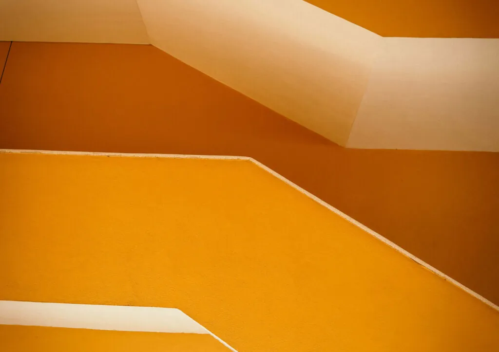 Architectural view of a bright yellow staircase