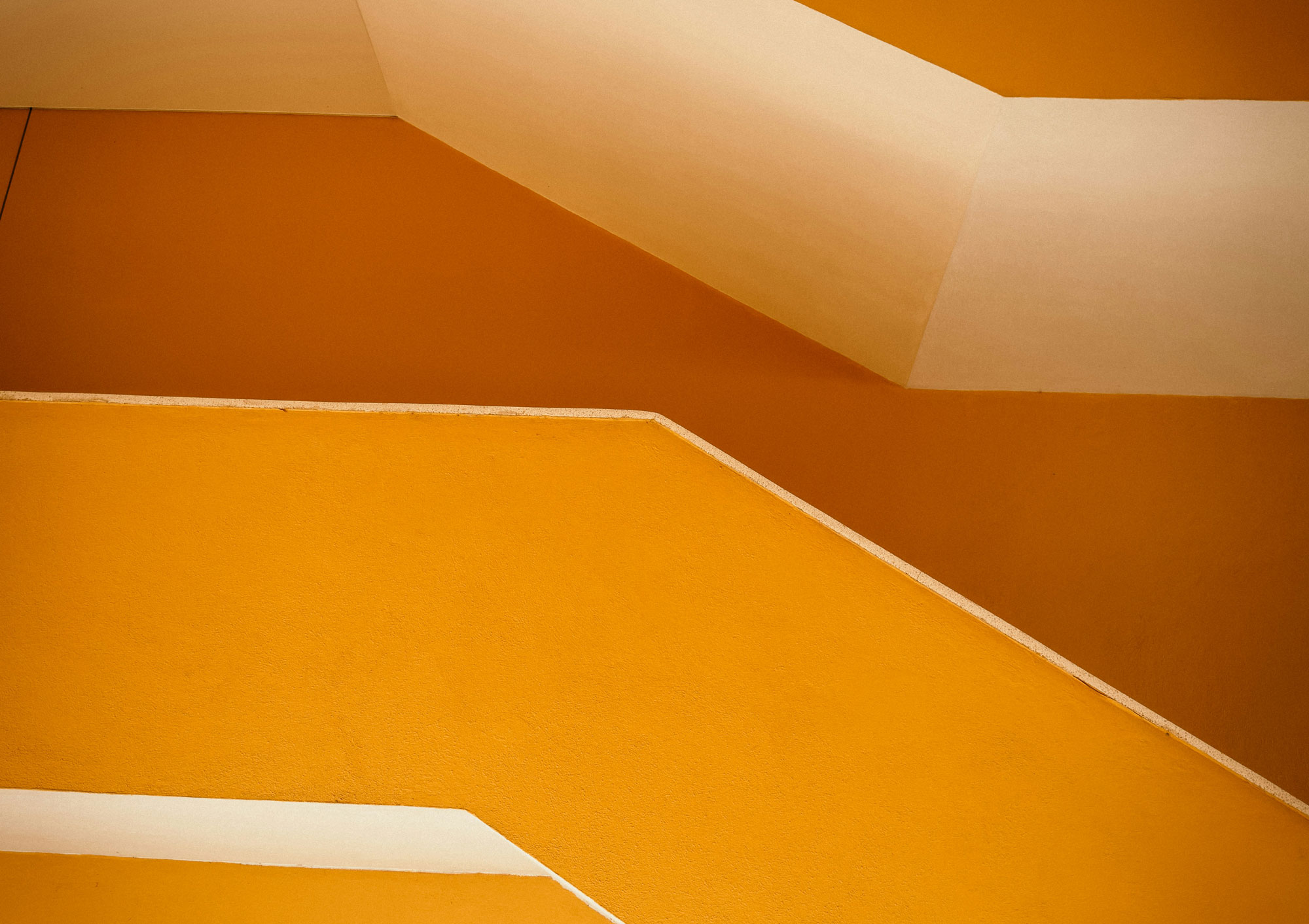 Architectural view of a bright yellow staircase